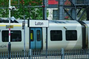 Beautiful Low Angle View of Train on Tracks at Central Railway Station of Luton England UK. Image Was Captured on May 06th, 2023 photo