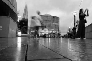 Gorgeous Low Angle View of London Bridge at River Thames Central London Tourist City of England UK. The Image Was Captured on June 18th, 2023 During Cloudy and Rainy sunset. photo