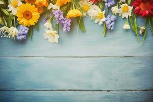 Bouquet of yellow flowers. Garden flowers over wooden background. Copy space. Flat lay. photo