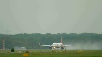 DUSSELDORF, GERMANY JULY 24, 2017 - Air Berlin Airbus 320 slowing after landing at rain. Dusseldorf airport, Germany video