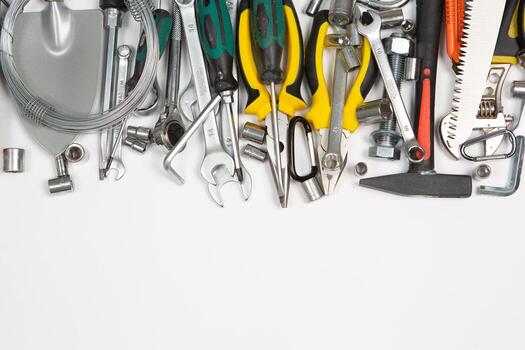 Set of tools for repair in a case on a white background. Assorted work or construction tools. Wrenches, Pliers, screwdriver. Top view photo