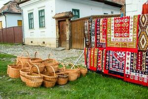 Rimetea is a small village located in Transylvania, Romania. It is situated in the Apuseni Mountains and is known for its picturesque setting and well preserved Hungarian architectural style. photo