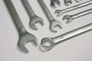 Set of tools for repair in a case on a white background. Assorted work or construction tools. Wrenches, Pliers, screwdriver. Top view photo