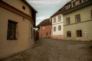 A beautiful medieval citadel city of Sighisoara in the heart of Romania, Transylvania travel destination in Eastern Europe. photo