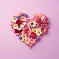 Pink heart made of flowers. Heart shape made of spring flowers on pink pastel background. AI Generated photo