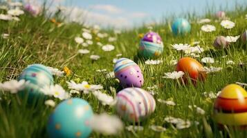 Easter eggs on grass. Spring meadow full of flowers and easter eggs still life. photo