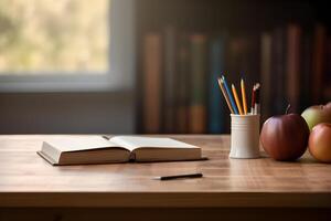 Wood table with Stationeries. Back to school background concept. photo
