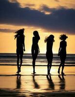 Silhouettes of friends enjoying beach activities together photo