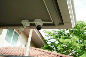 CCTV security camera system outdoor in private house or village, Closed Circuit Television System. photo