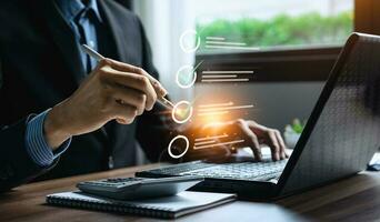 Business performance checklist, businessman using laptop doing online checklist survey, Check marks on checklist and Filling online form or answering questions. evaluation, online survey, online exam. photo