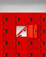 Red skateboard in a red locker with an open lid. photo