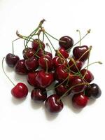 fresh juicy sweet cherry on white background photo