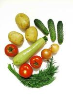 fresh vegetables, potatoes, tomatoes, cucumbers, zucchini, onions, dill, ingredients for cooking photo