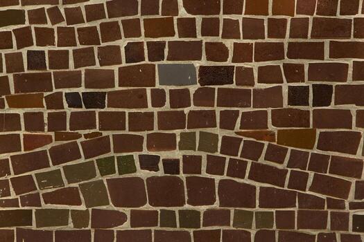 Colorful ceramic mosaic on the walls of the building. Abstract background and texture for design. photo