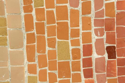 Colorful ceramic mosaic on the walls of the building. Abstract background and texture for design. photo