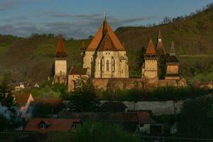 Biertan a very beautiful medieval village in Transylvania, Romania. A historical town in Romania that has preserved the Frankish and Gothic architectural style. Travel photo. photo