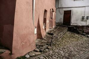 A beautiful medieval citadel city of Sighisoara in the heart of Romania, Transylvania travel destination in Eastern Europe. photo