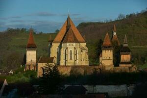 Biertan a very beautiful medieval village in Transylvania, Romania. A historical town in Romania that has preserved the Frankish and Gothic architectural style. Travel photo. photo