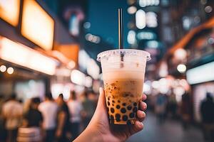 Generative AI illustration of hand holding Taiwan milk tea and blurry background photo