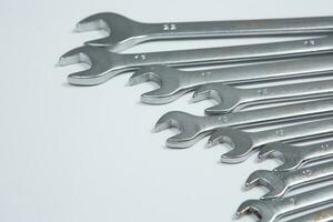 Set of tools for repair in a case on a white background. Assorted work or construction tools. Wrenches, Pliers, screwdriver. Top view photo