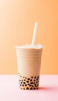 https://static.vecteezy.com/system/resources/thumbnails/026/274/672/small/generative-ai-illustration-of-product-plastic-cup-of-boba-milk-tea-with-bubbles-fun-pastel-background-photo.jpg