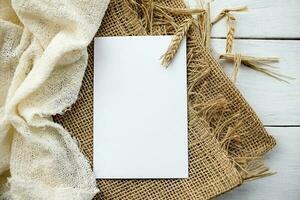 white card layout for text on textile textured background photo