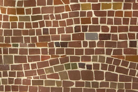Colorful ceramic mosaic on the walls of the building. Abstract background and texture for design. photo