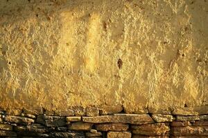 Soil wall texture of old clay house structure. One kind of material make house wall in North Vietnam photo