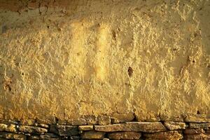 Soil wall texture of old clay house structure. One kind of material make house wall in North Vietnam photo