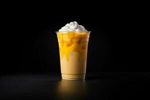 Mango smoothie milkshake in plastic takeaway cup isolated on dark background. ai generated photo