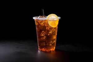 Iced lemon tea on plastic takeaway glass isolated on dark background. ai generated photo