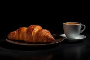 cup of coffee and croissants isolated on a black background. photo