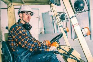 Caucasian Forklift Operator photo