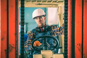 Caucasian Forklift Worker photo