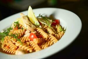 pollo pasta cena foto