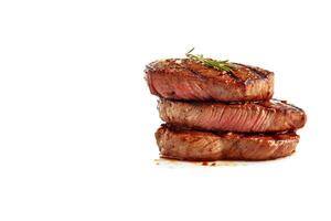 Beef steak medium grilled isolated on white background with copy space. photo