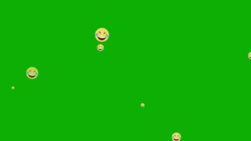 Happy, Laughing Face Emoji Floating from Bottom to the Top on Green Background video