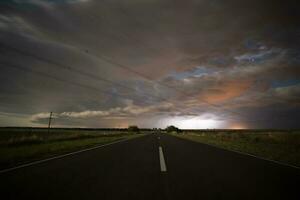 Road  in the Pampas plain,La Pampa Province,  Patagonia, Argentina photo