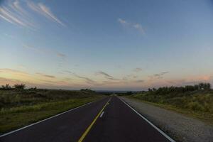 Road  in the Pampas plain,La Pampa Province,  Patagonia, Argentina photo