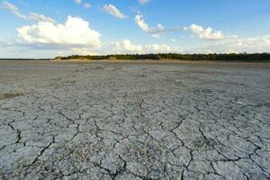 Broken dry soil in a Pampas lagoon, La Pampa province, Patagonia, Argentina. photo