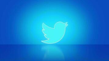 Madrid, Spain - July, 2023. Twitter logo in neon with space for text and graphics. Blue background. video