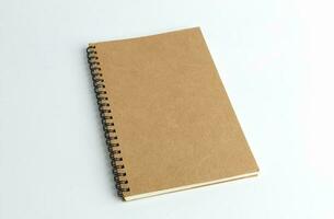 blank cover spiral notebook on white background for mockup blank template photo