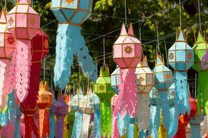 colorful hanging lanterns lighting in loy krathong and new year festival at northern of thailand photo