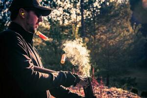 Professional Skeet Shooter After Successful Shot photo