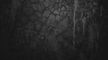 negro pared antecedentes de natural Cepillo de pintura carrera texturizado cemento o Roca viejo. hormigón textura como un concepto de horror y Víspera de Todos los Santos foto