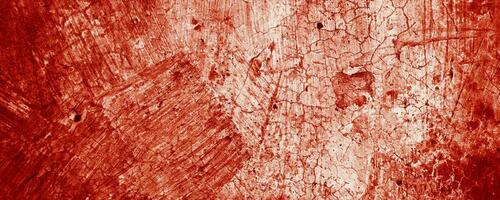 Splatters of red paint resemble fresh blood, their jagged edges contributing to a sense of unease. The stains, reminiscent of Halloween horrors. photo