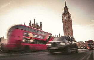 Big Ben. Red bus. British Taxi. Westminster Bridge. photo
