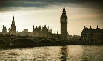 Big Ben, Westminster Bridge stylized as old photo. Vintage theme. photo
