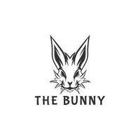 rabbit head icon logo design template. Monochrome bunny head from front vector illustration