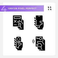 Hands with mobile devices pixel perfect black glyph icons set on white space. Appliances for control and communication. Silhouette symbols. Solid pictogram pack. Vector isolated illustration